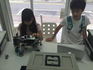 Working together on figuring out the program for the Lego Mindstorms EV3